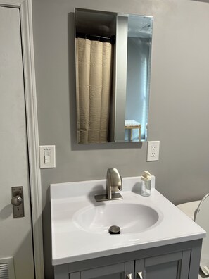 Hair dryer, towels, soap, shampoo