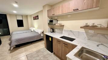 Family Studio Suite | 1 bedroom, Egyptian cotton sheets, premium bedding, down comforters