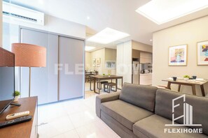 Basic Studio Suite, 1 Queen Bed, Non Smoking, Bathtub | Living area | 34-inch TV with digital channels, streaming services - Dorsett Residences, Sri Hartamas-KL, Hotel Theme Studio Homes by Flexihome-MY (Kuala Lumpur)