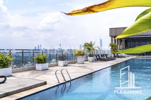 Outdoor pool, open 8:00 AM to 9:00 PM, pool loungers