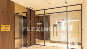 A modern elevator with a sign indicating it is for visitor use to level 27. - Dorsett Residences, Sri Hartamas-KL, Hotel Theme Studio Homes by Flexihome-MY (Kuala Lumpur)