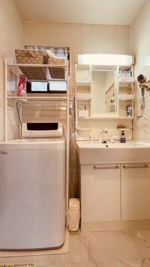 Hair dryer, bidet, towels, soap