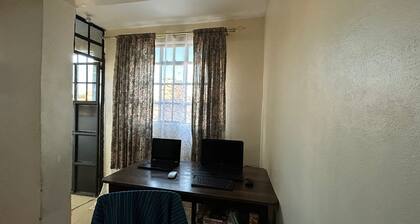 Warm Studio Apartment Kitui Town with Patio.
