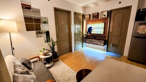 Living area - 2 Bedroom Condo, with Free Pool Access, Wifi with Netflix (Pasig)