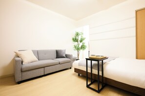 Flat-screen TV, fireplace - Residence Hotel Liberte (Sapporo)