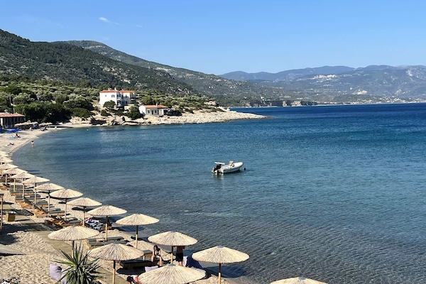 Private beach, sun loungers, beach umbrellas