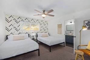 4 bedrooms, desk, iron/ironing board, travel cot