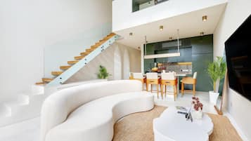 Executive Townhome, 2 Bedrooms | Living area | Flat-screen TV