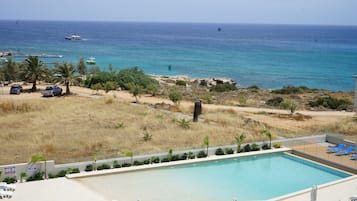 Outdoor pool, pool umbrellas, pool loungers