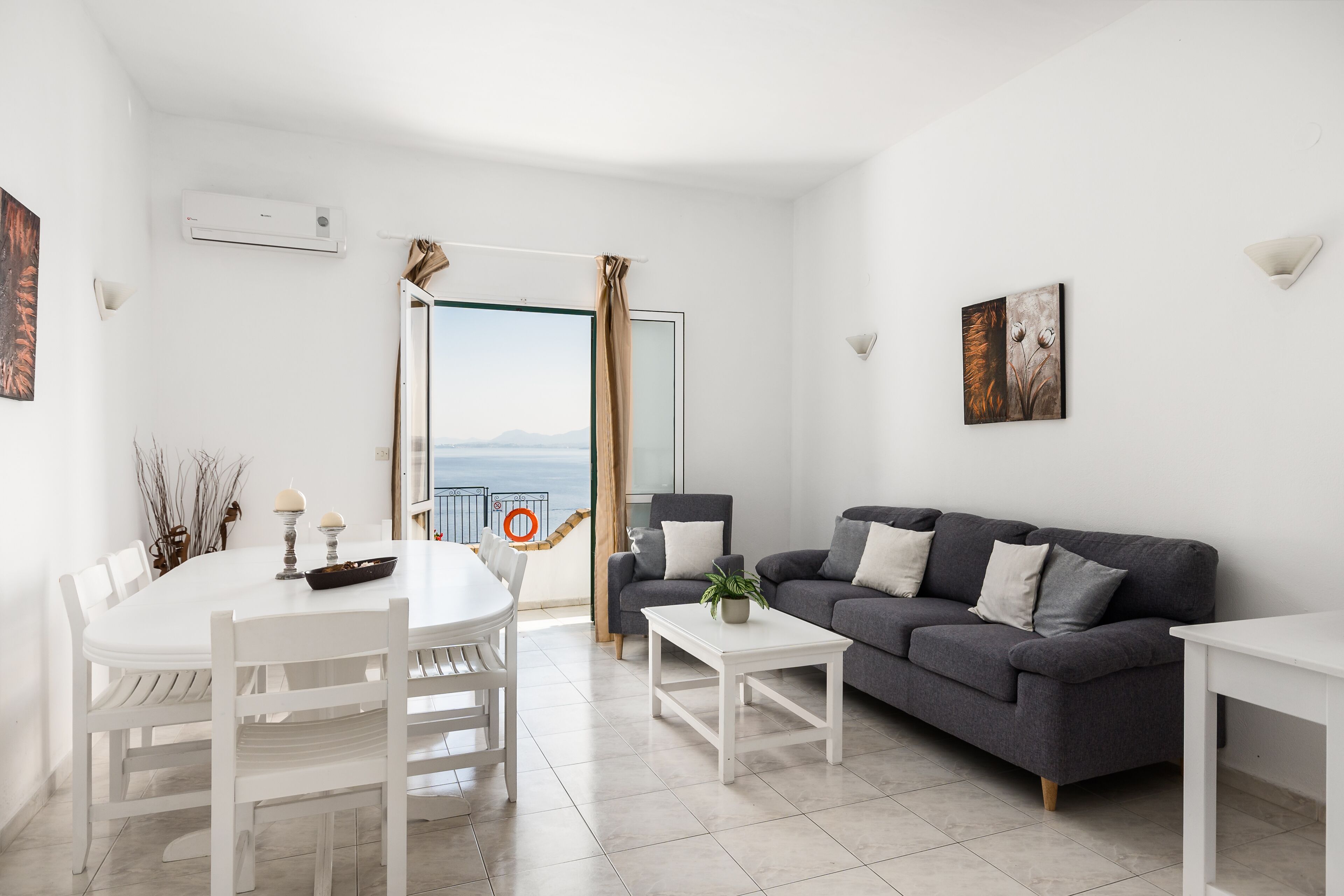 Villa | Living area | 32-inch flat-screen TV with satellite channels, DVD player