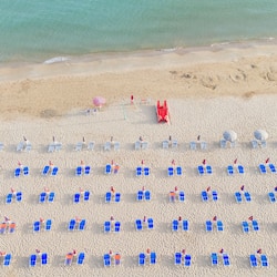 On the beach, white sand, beach volleyball, beach bar