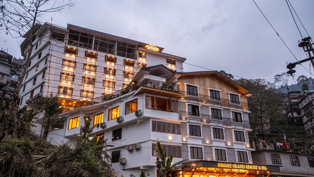 A multi-story hotel with balconies and a sign reading "SUMMIT GRAND RESORT & SPA". - SUMMIT GRAND RESORT & SPA , GANGTOK  (Gangtok)