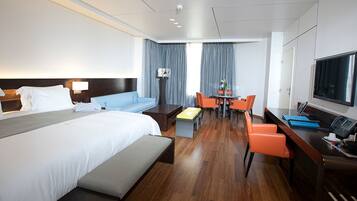 Luxe beddengoed, bedden met traagschuimmatrassen, een minibar