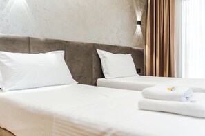 Business tvåbäddsrum | 1 sovrum, italienska Frette-lakan och sängtillbehör av högsta kvalitet