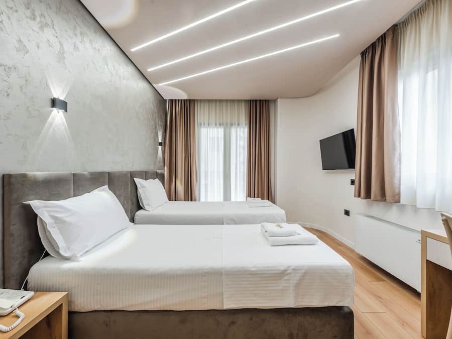 Frette Italian sheets, premium bedding, down comforters
