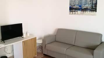 Quarto quádruplo família, 2 quartos | Cofres nos quartos, cortinas blackout