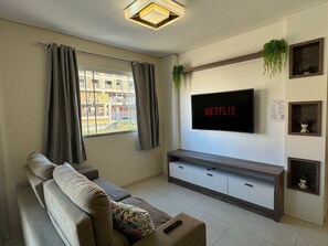Apartamento | Área de estar | TV