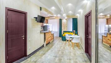 Apartment | Living area | 37-inch LED TV with digital channels