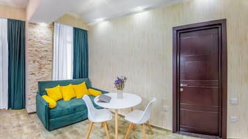 Apartament | Sala d'estar | Televisor LED de 37 polzades amb canals digitals