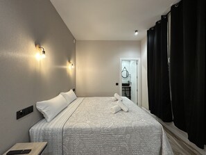 Superior Room | In-room safe, desk, laptop workspace, blackout drapes