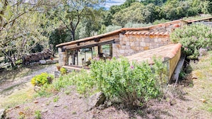 A rustic stone house with a tiled roof, surrounded by lush greenery and trees. - Wonderful private villa for 4 people with WIFI, private pool and TV (Lentier)