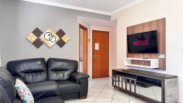 Apartamento | Área de estar | Smart TV