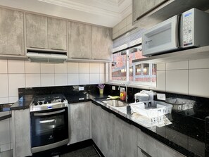 Appartamento | Cucina privata | Frigorifero, microonde, frullatore, pentole/stoviglie/utensili