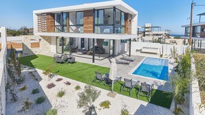 A modern two-story house with a rooftop terrace, a swimming pool, and a well-maintained garden. - Villa Elise, Stunning and Brand New 3BDR Protaras Villa with Private Pool (Protaras)