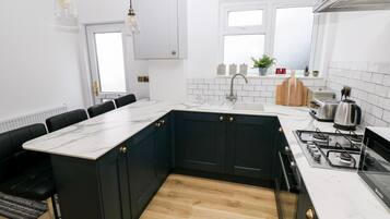 Fridge, dishwasher, electric kettle, toaster