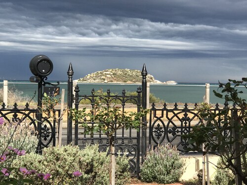 Beachfront romantic Greek Isle vibe rare  historic cottage breathtaking sunrises