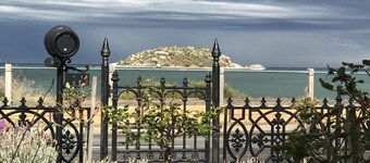 Beachfront romantic Greek Isle vibe rare  historic cottage breathtaking sunrises