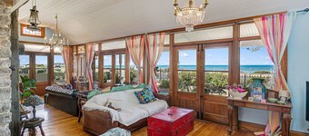 Beachfront romantic Greek Isle vibe rare  historic cottage breathtaking sunrises