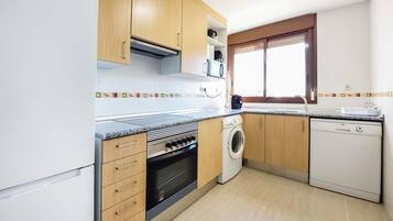 Réfrigérateur, four, plaque de cuisson, lave-vaisselle