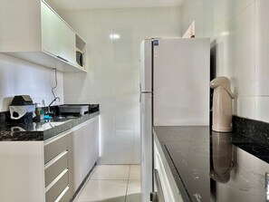 Apartment | Private kitchen - Residencial Falcão (Bombinhas)