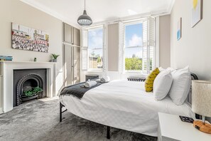 1 habitación, tabla de planchar con plancha, wifi gratis y ropa de cama 