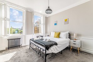 1 habitación, tabla de planchar con plancha, wifi gratis y ropa de cama 