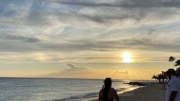 On the beach, white sand, beach towels