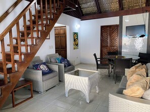 Family Apartment, Multiple Beds, Ocean View | Living area | 30-inch Smart TV with digital channels - Hostal Magallanes Bayahibe (San Rafael del Yuma)