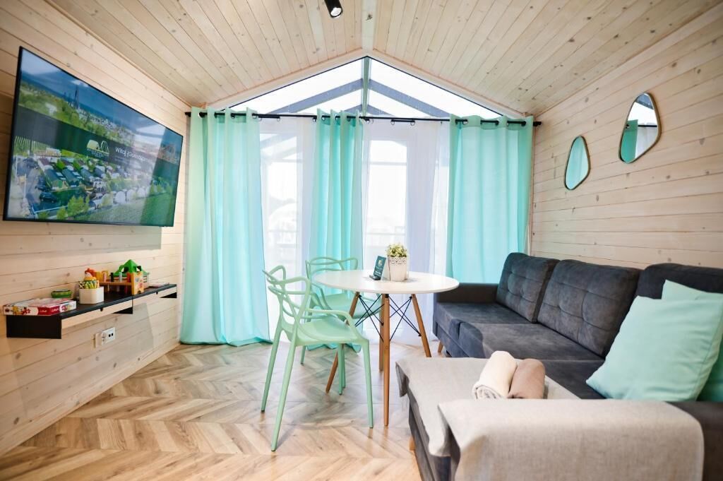 Exclusive Chalet | Living room | 40-inch LCD TV with satellite channels, toys