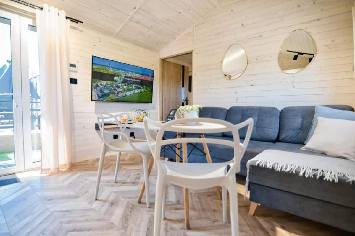Exclusive Chalet | Living area | 40-inch LCD TV with satellite channels, toys