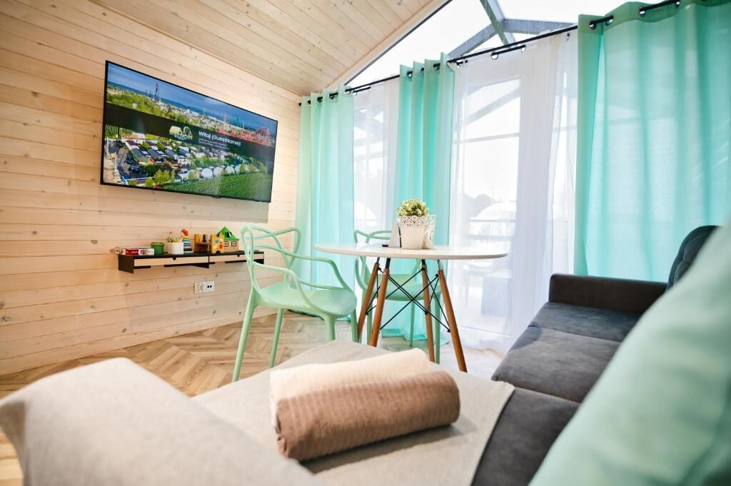 Exclusive Chalet | Living room | 40-inch LCD TV with satellite channels, toys