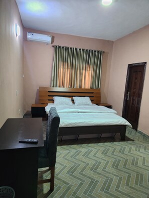 Deluxe Double Room | Minibar, desk, bed sheets - See Good Guest House Enimarire (Lekki)