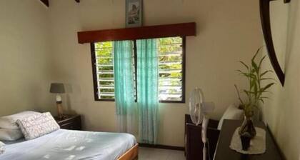 AgriTourism Villa within the tranquil jungle of Mahe, 5mins from the beach.
