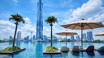 Indoor pool, outdoor pool, open 9:00 AM to 10:00 PM, pool umbrellas