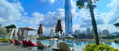 Indoor pool, outdoor pool, open 9:00 AM to 10:00 PM, pool umbrellas