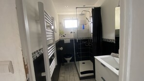 Hair dryer, towels, soap, toilet paper