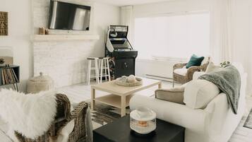 Smart TV, fireplace, books