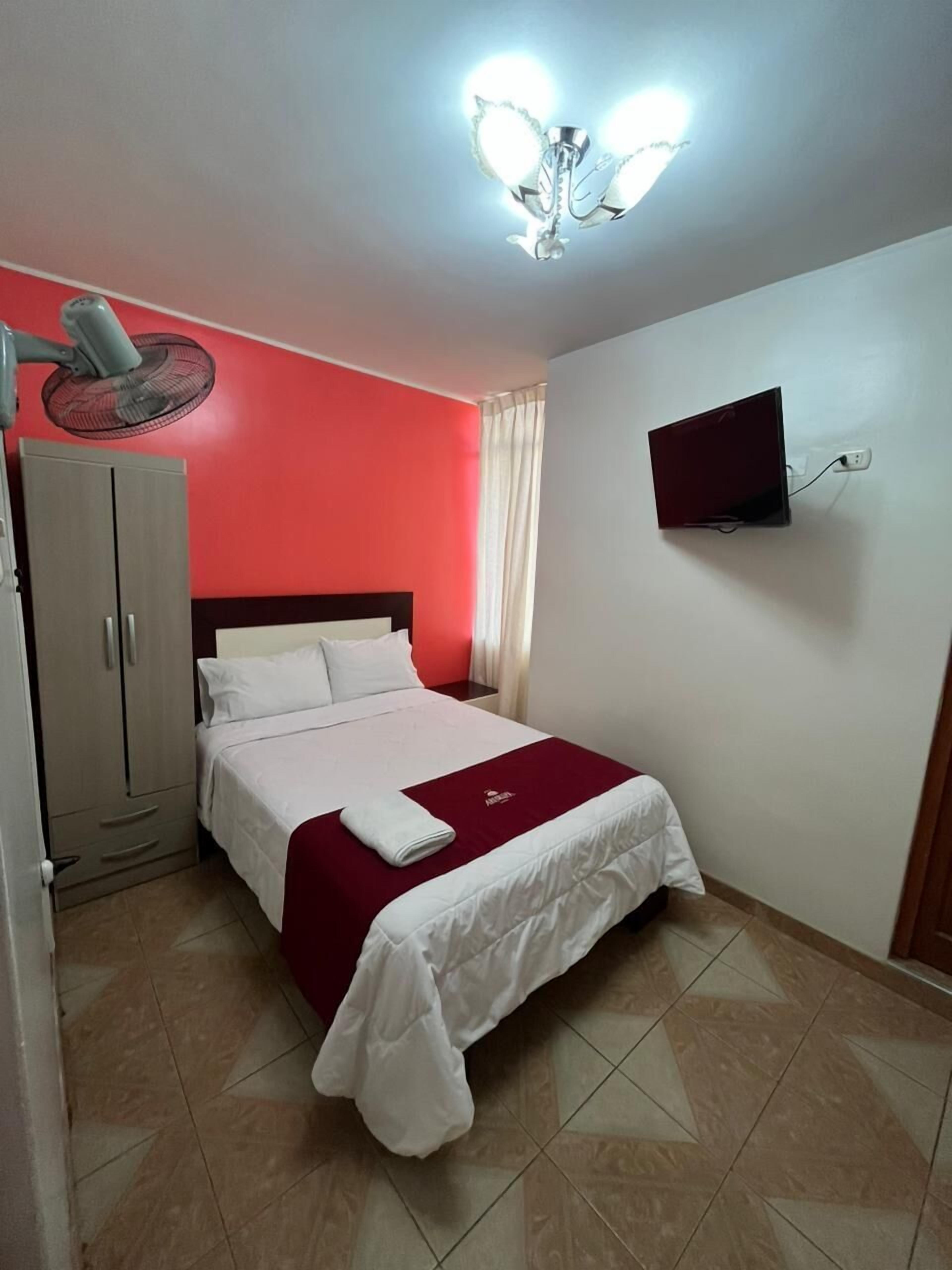 Laptop workspace, free WiFi, bed sheets