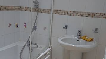 Hair dryer, towels, soap, shampoo