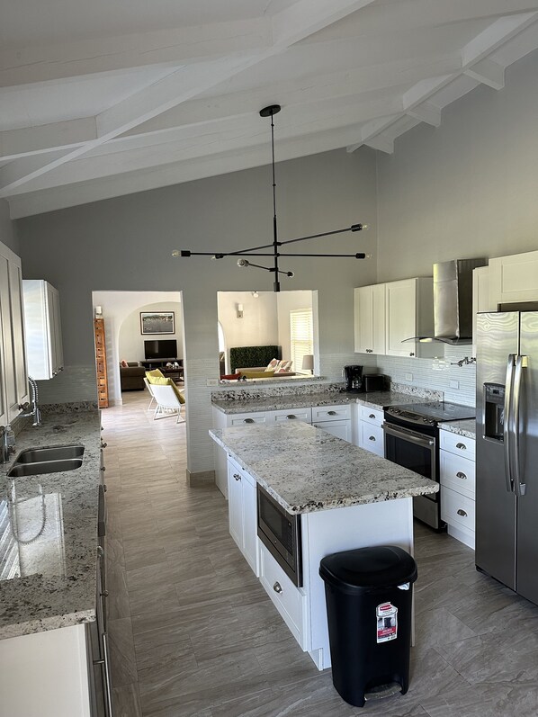 Fridge, microwave, oven, stovetop - Judith's Fancy Aqua Blue in a secure neighborhood & walking distance to beach. (Christiansted)